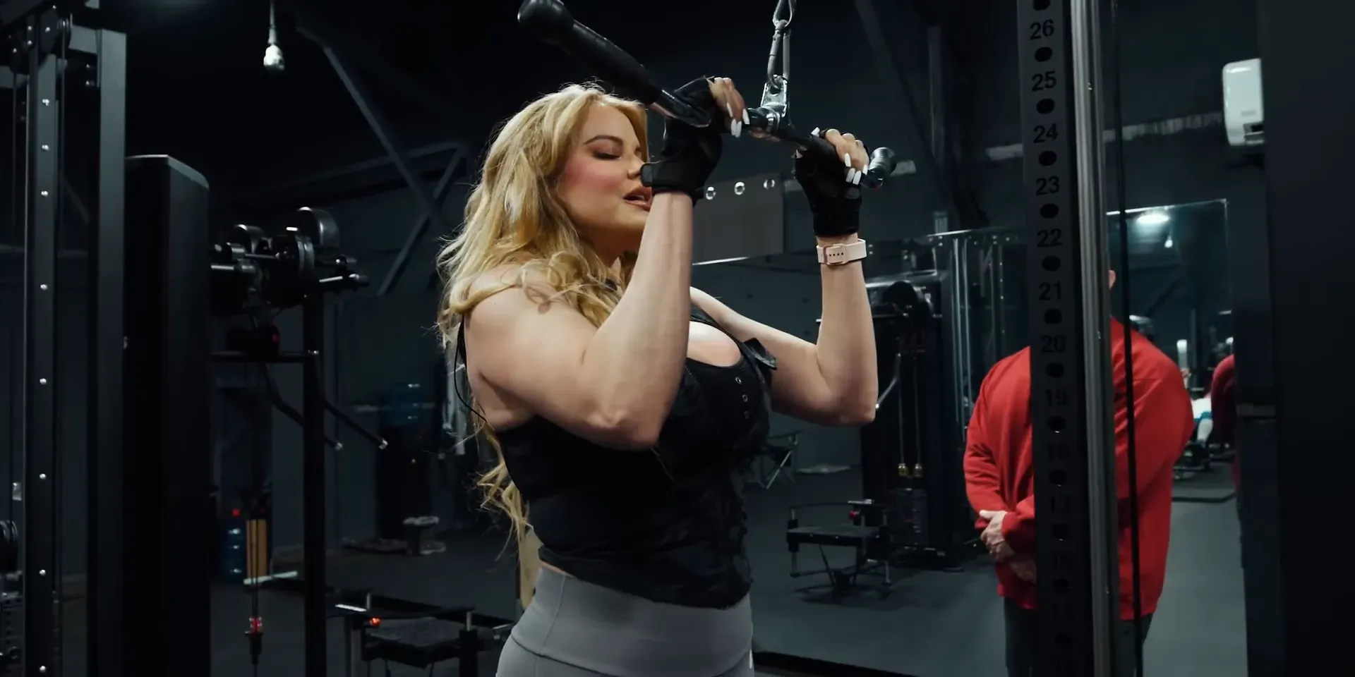 Demonstrating proper form for curls