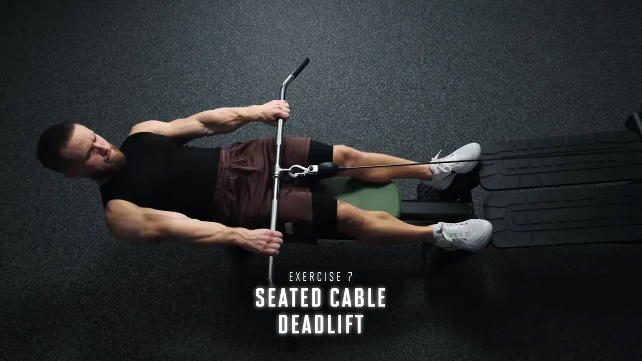 Seated cable deadlift setup with feet on platform