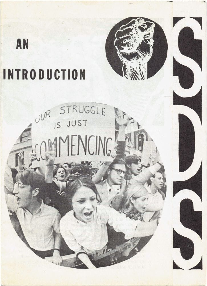 SDS pamphlet printed via mimeograph. "SDS" and "An Introduction" are printed around a photograph of student protesters holding a sign which reads, "Our struggle is just commencing"