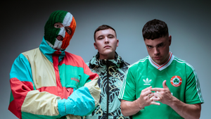 Kneecap respond to “dead Tory” and flag incidents ahead of Glastonbury performance, as TRNSMT boss says he’s “frustrated” the band had to be axed from his event