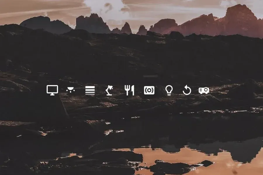 Source preview of infinibar: A taskbar-style Rainmeter strip combining system monitoring, clock, weather and quick-access buttons with hover effects