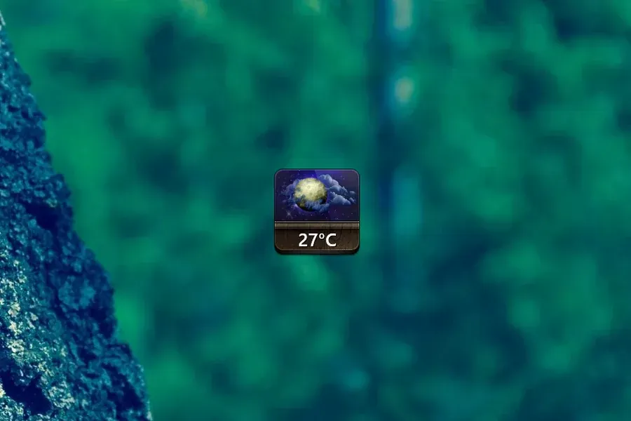 Source preview of Jaku Weather Rainmeter Skin credited to YahibazOu