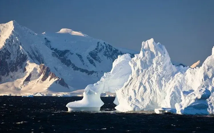 Antarctic landscapes featuring glaciers, ice shelves, and ice sheets.