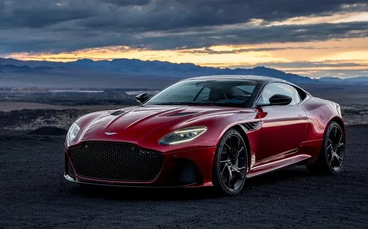Fourteen wallpapers featuring the Aston Martin DBS grand tourer.