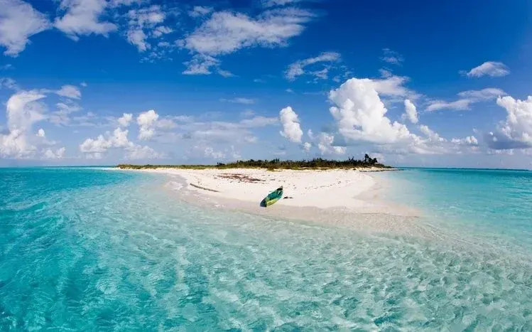 Bahamas wallpapers with beaches, turquoise waters, coves, dolphins, and sunset views.