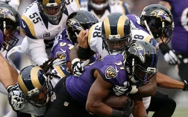 Baltimore Ravens wallpapers featuring team stills from different football matches.