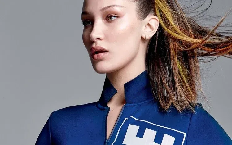 Bella Hadid in close views and varied modeling poses across different scenes.