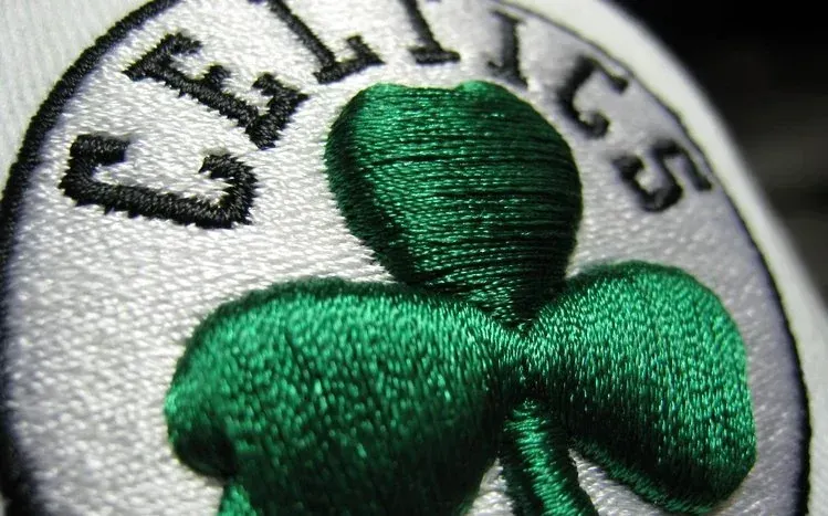 Boston Celtics symbols with green, white, and black coloring.
