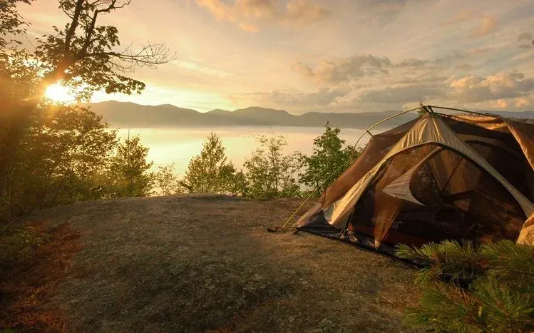 Camping-themed wallpapers associated with outdoor recreation and nature.