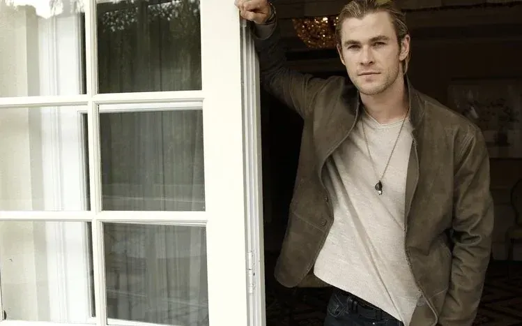 Chris Hemsworth photoshoot images emphasizing blue eyes and facial expressions.