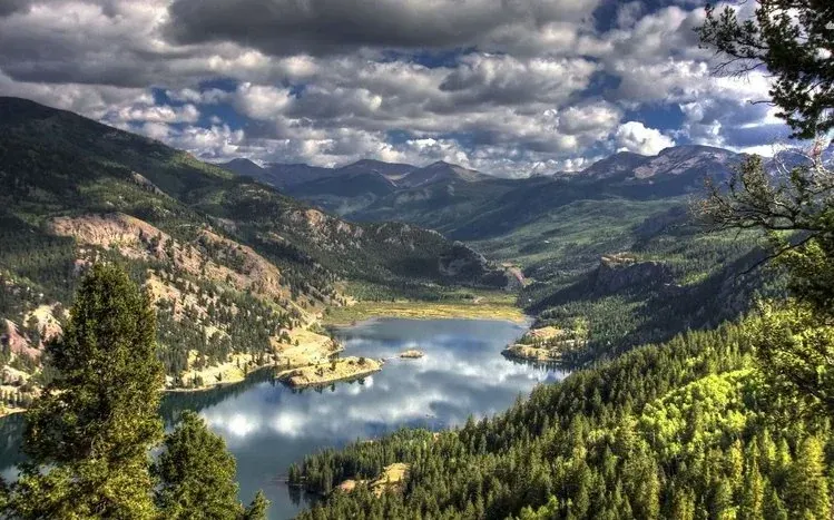 Colorado landscapes featuring snow-covered mountains and arid deserts.