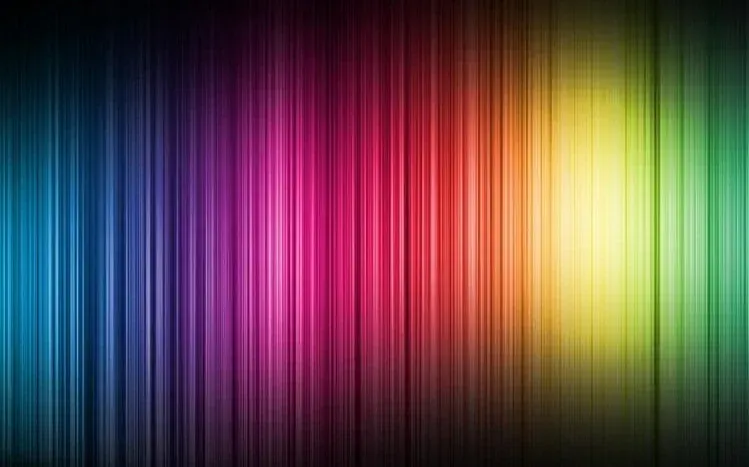 Rainbow-colored wallpaper imagery with colors spread across the screen.