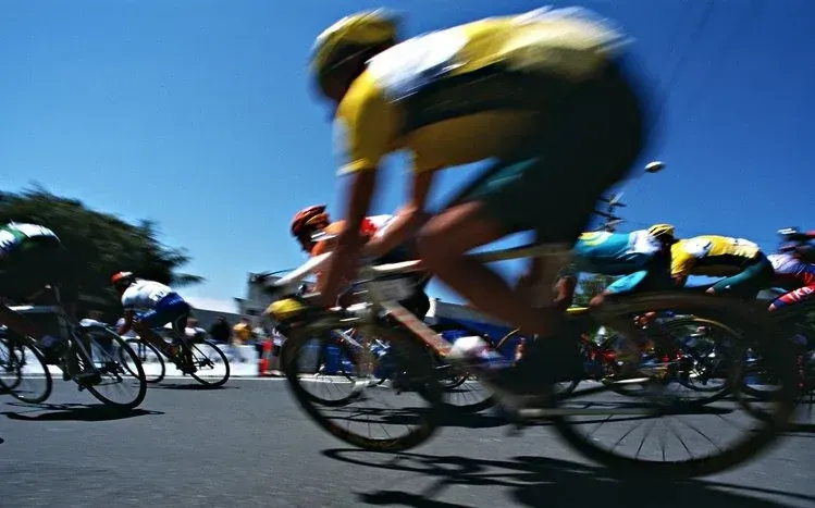 Cyclists racing in photographs treated with different filters.