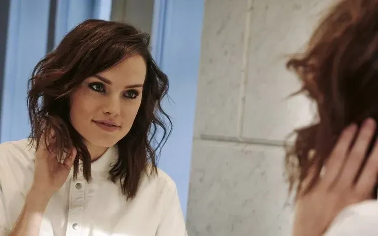 Daisy Ridley in varied poses in event and photoshoot photographs.