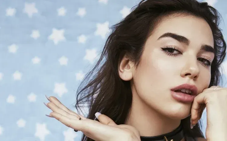 A sixteen-image wallpaper collection featuring singer Dua Lipa.