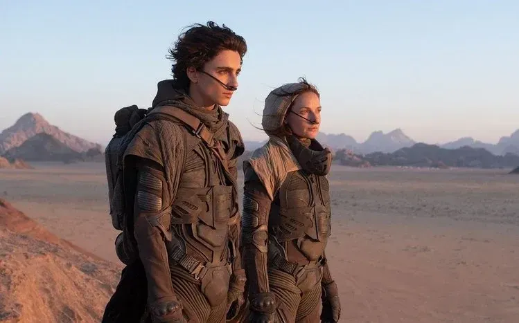 Dune film wallpapers featuring characters in action scenes.