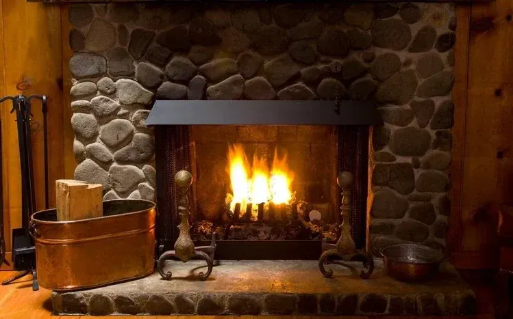 Fireplace wallpapers featuring flames and rustic surroundings.
