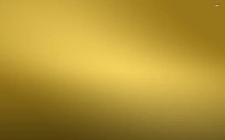 Gold-colored wallpaper imagery with a textured rather than smooth surface.
