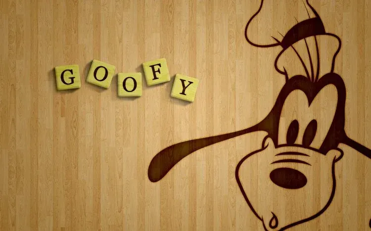 Goofy featured in a fishing-themed cartoon wallpaper.