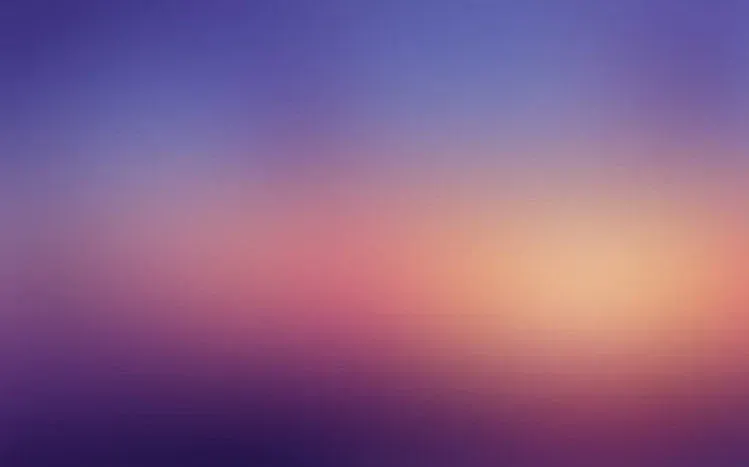 Abstract color gradients spanning light and dark tones.