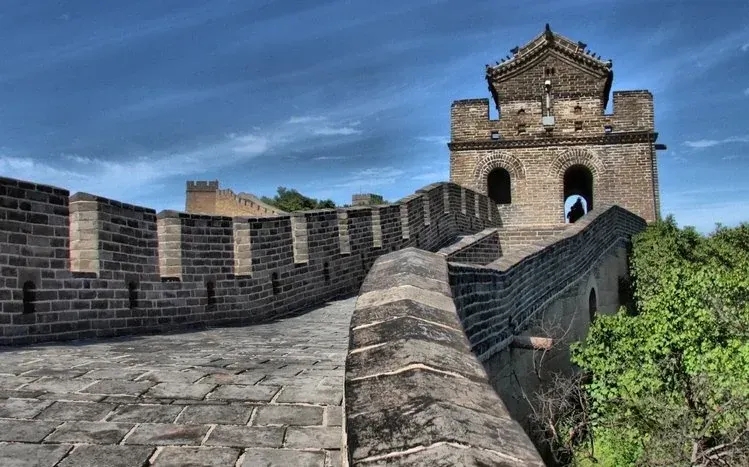 Great Wall of China photographs from different angles and with varied backgrounds.
