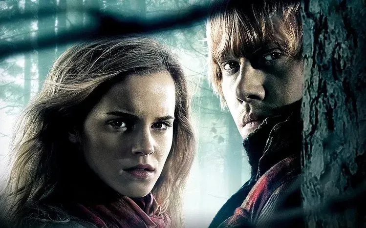 Emma Watson as Hermione Granger in Harry Potter character wallpapers.