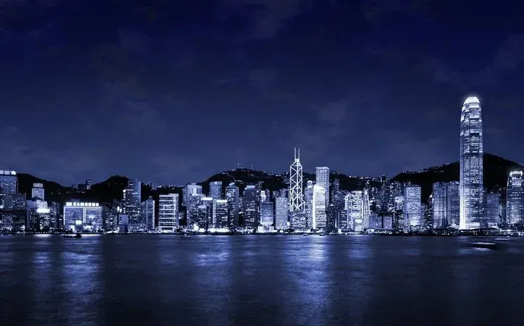Hong Kong city scenes showing large buildings from varied viewpoints and times of day.