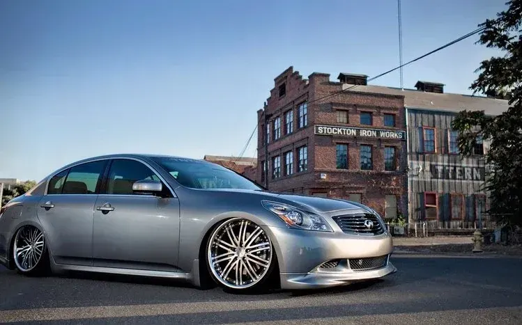 Infinity Cars wallpaper collection highlighting a sleek two-door coupe.