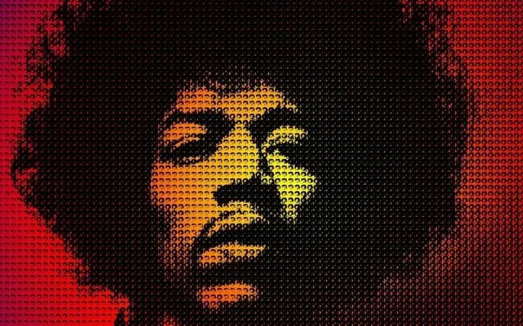 Jimi Hendrix grinning in a musician-focused wallpaper preview.