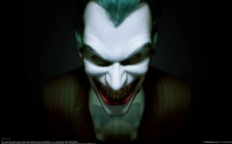 The Joker smiling against a black background.