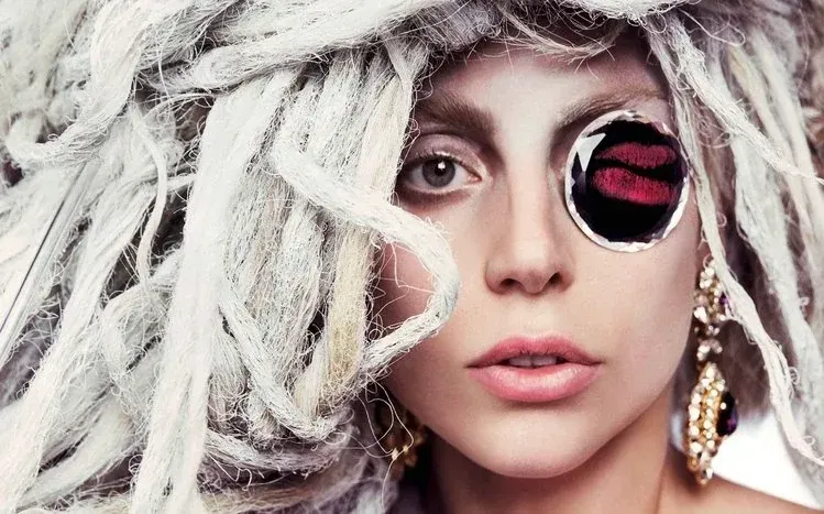 Lady Gaga-themed wallpaper collection centered on the singer and performer.