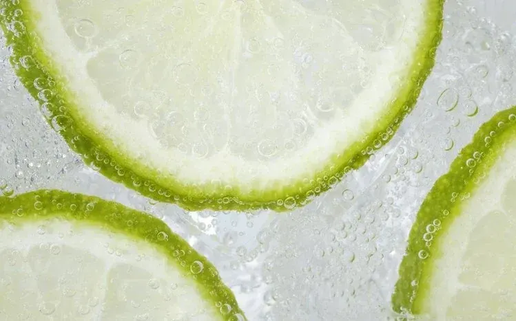 Lime fruit wallpapers highlighting green exteriors and pale interiors.