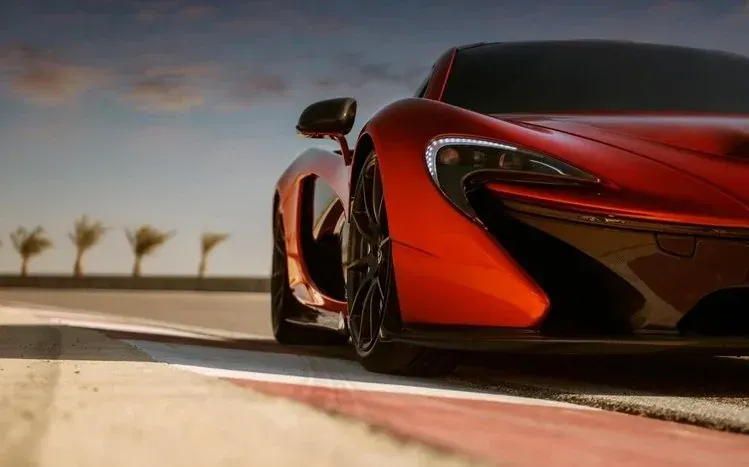 McLaren P1 plug-in hybrid sports car shown from different angles.