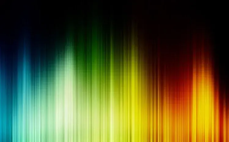 Rainbow colors distributed across the full wallpaper area.
