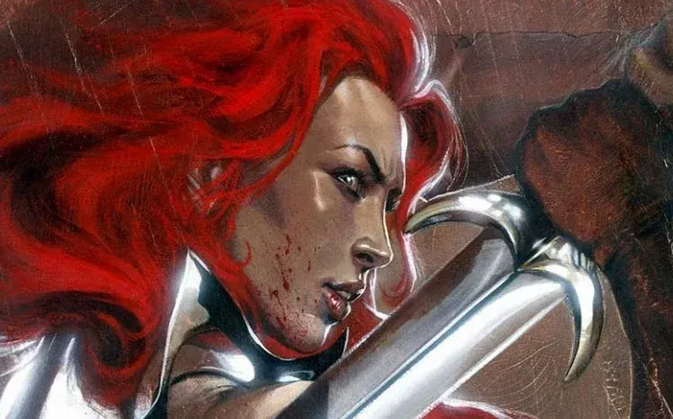 Red Sonja character wallpapers featuring varied poses and a sensual presentation.
