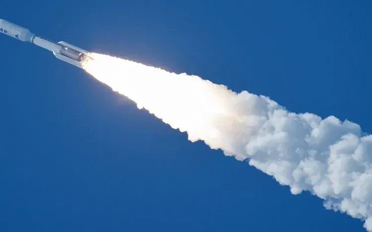 Rocket-themed imagery with scenes from Earth and space.