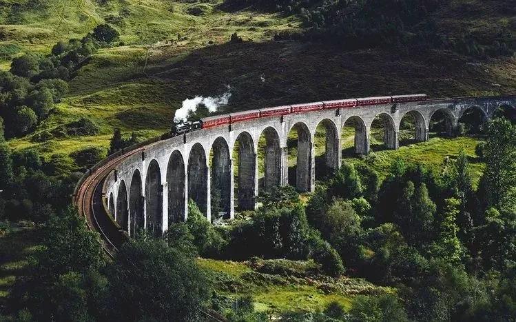 Scottish green landscapes, nighttime cities, bridges, railways, and castles.