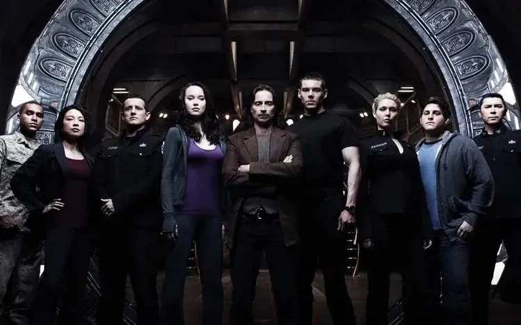 Stargate Universe wallpapers featuring outer space and series characters.