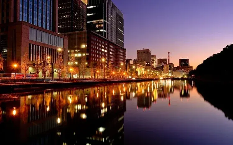 Tokyo architecture encompassing modern skyscrapers, historic temples, and city landmarks.