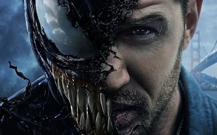 Venom movie character imagery associated with Eddie and the alien creature.