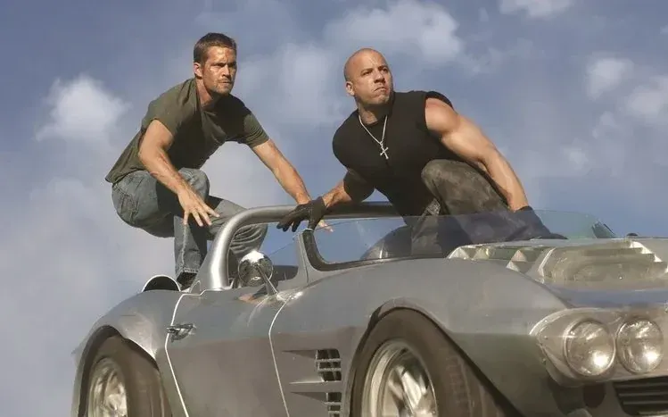 Vin Diesel performance stills, including some with Paul Walker and Dwayne Johnson.