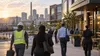 Workers arriving at a Birmingham employment district in early morning light
