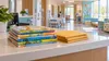 Illustrative view of children’s books prepared for families at a pediatric hospital discharge area.