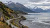 The Seward Highway and Alaska Railroad follow Turnagain Arm beneath the Chugach Mountains.