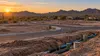 Housing development and new utility infrastructure at the edge of an Arizona desert community