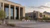 Modern courthouse and county administration buildings in a Phoenix desert setting at late afternoon.
