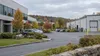 Illustrative view of a modern office and light-industrial district in Connecticut during early autumn.