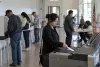 Voters cast ballots at a neutral community polling place during a U.S. midterm election.