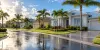 A generic Florida suburban neighborhood after rain, illustrating homeowners insurance and policy renewals.