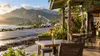 Open-air Kauai cafe beside coastal utility restoration work after a hurricane
